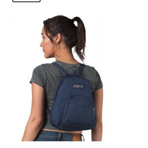 Dark blue jansport half pint backpack / bookbag